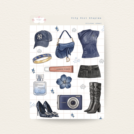 Collection of fashion items including a cap, handbag, top, skirt, boots, and camera on a light gray background.