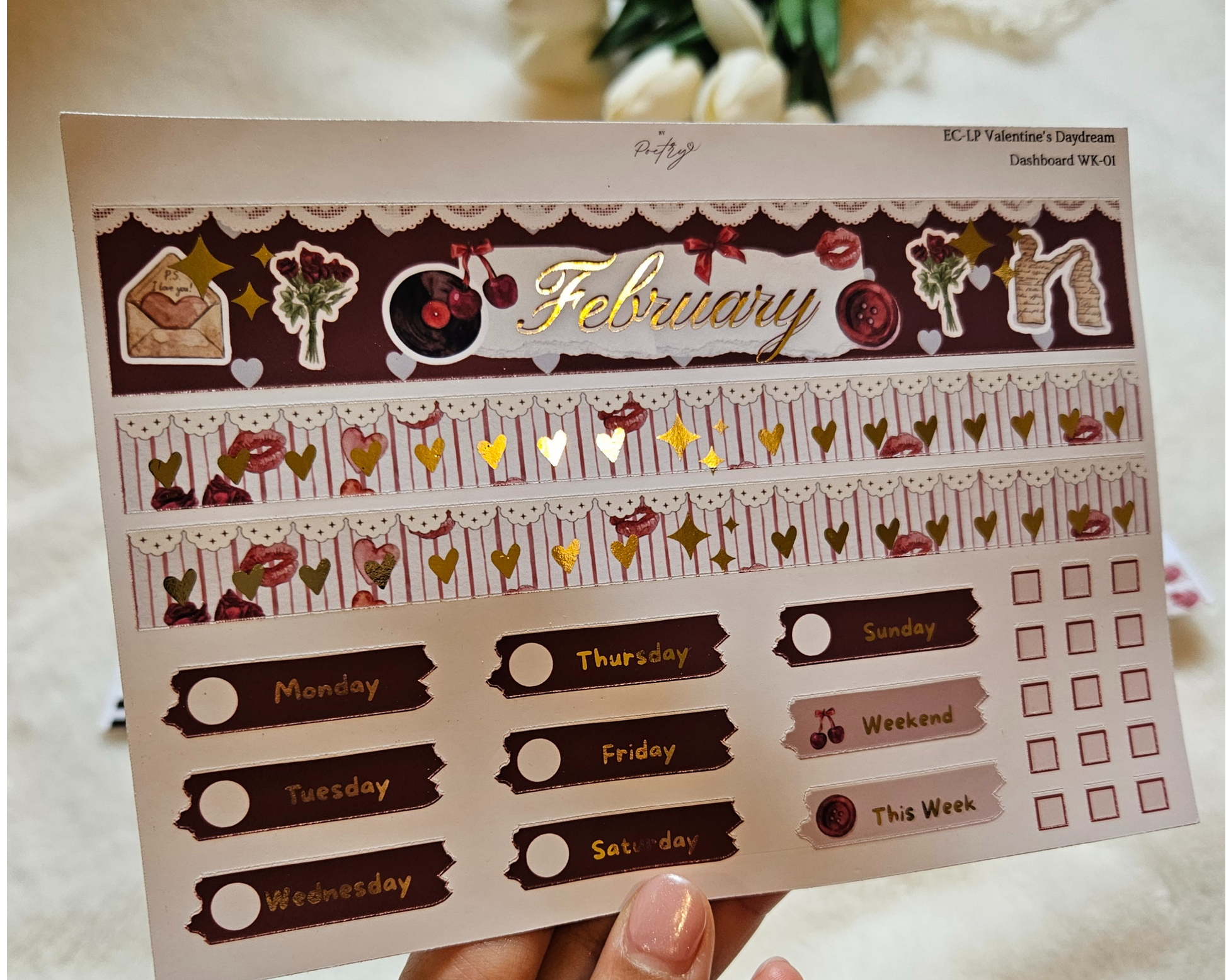 Sticker sheet with February-themed design and calendar elements.